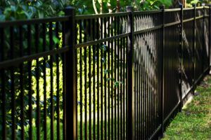 Fence Installation Chester NJ close up of Black Aluminum Fence surrounding residential property