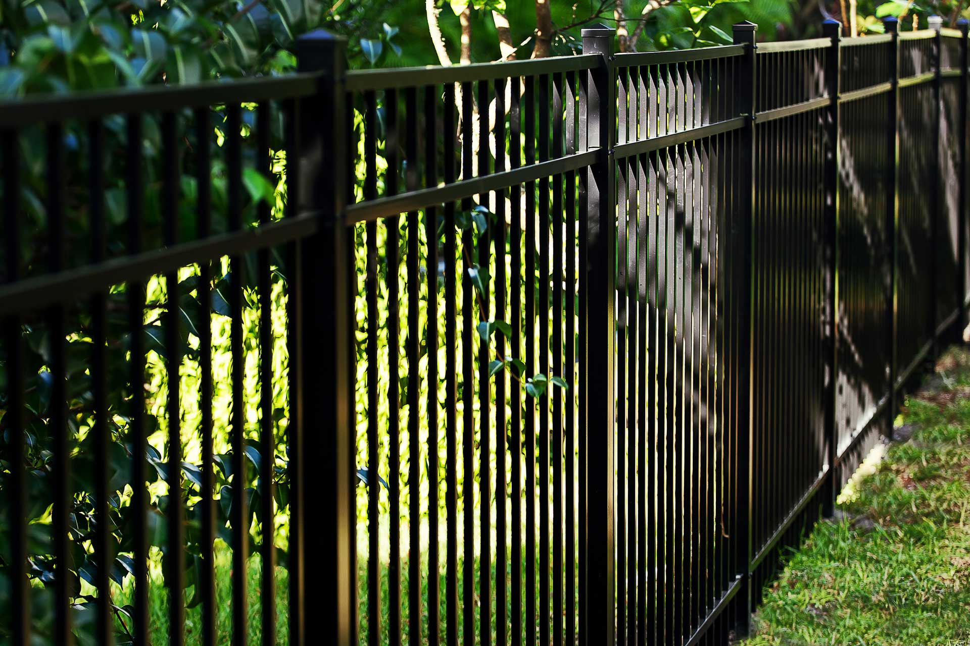 bigstock-Black-Aluminum-Fence-With--Ra-237422983-web