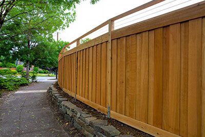 What’s The Best Fence Style For Fences For Sloped Yards?